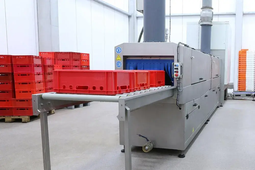 Different types of crates in a crate washer